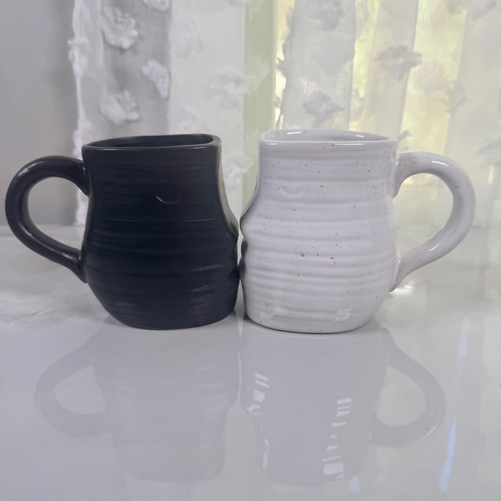 Lot of 2 World Market Kissing Abstract Face Mugs‎ Speckled White Matte Black New